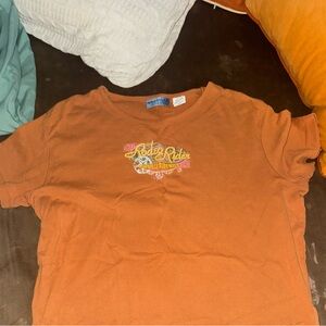 Y2K Wrangler Orange Short Sleeve Tee with Rodeo Rider Graphic